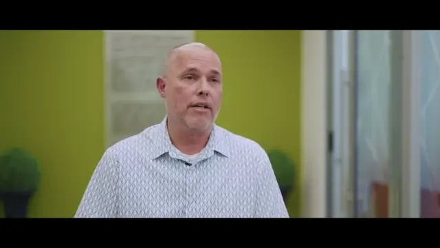Johnson & Johnson executive speaking on camera in a corporate video interview